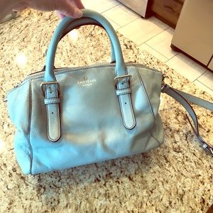 Used blue all leather Kate Spade crossbody purse.